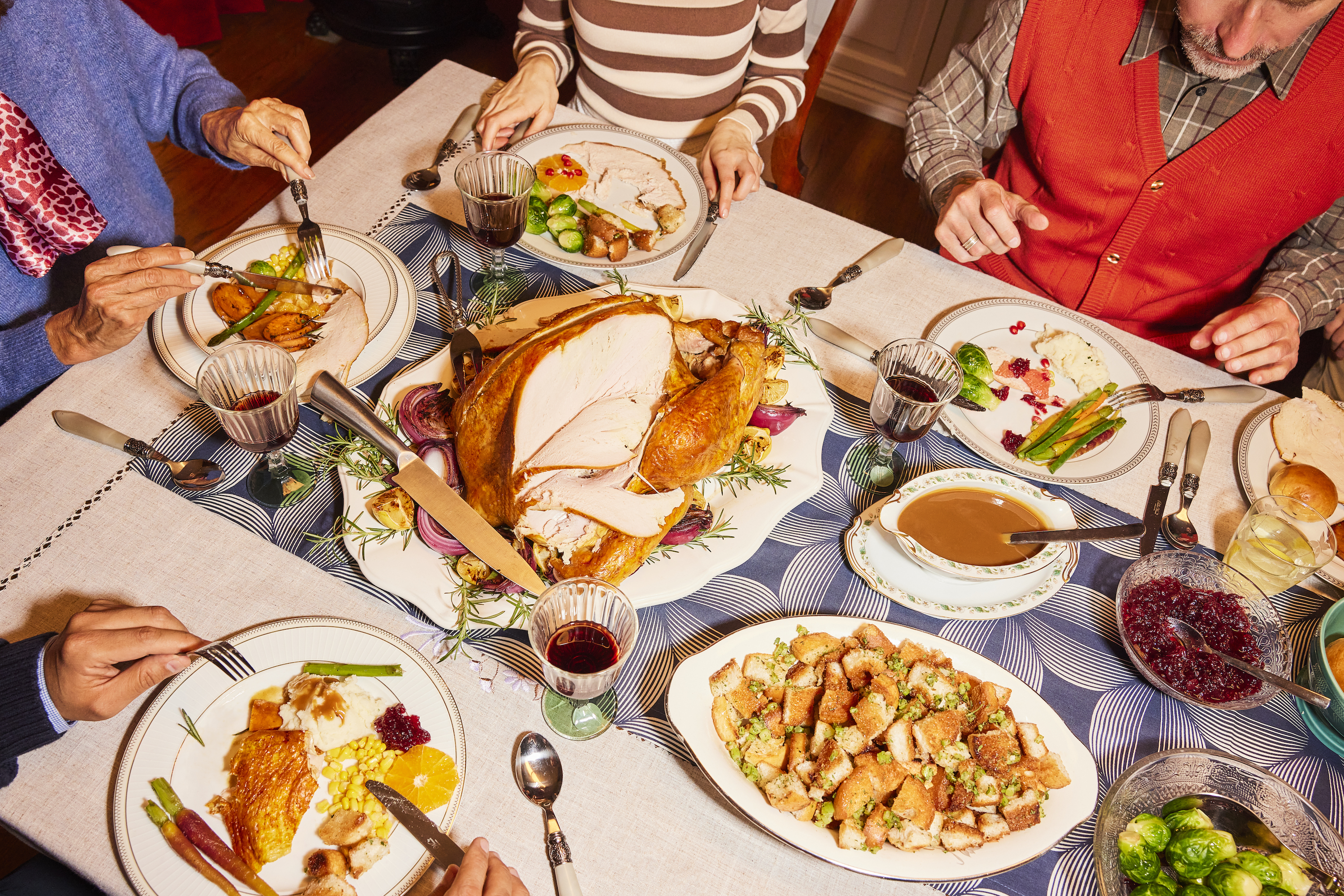 Close up view of a table with turkey dinner spread.