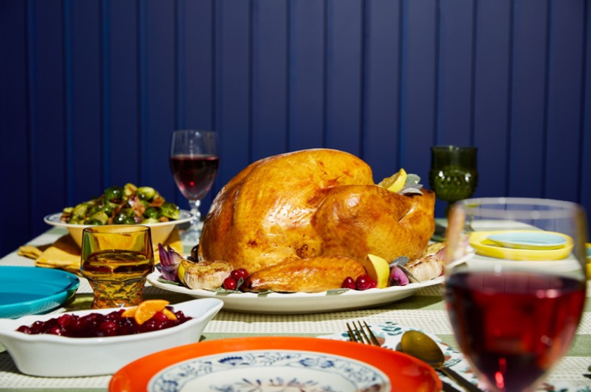 A prepared turkey on a Thanksgiving table.
