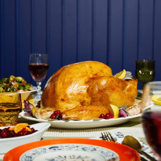 A prepared turkey on a Thanksgiving table.