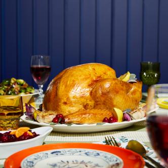 A prepared turkey on a Thanksgiving table.