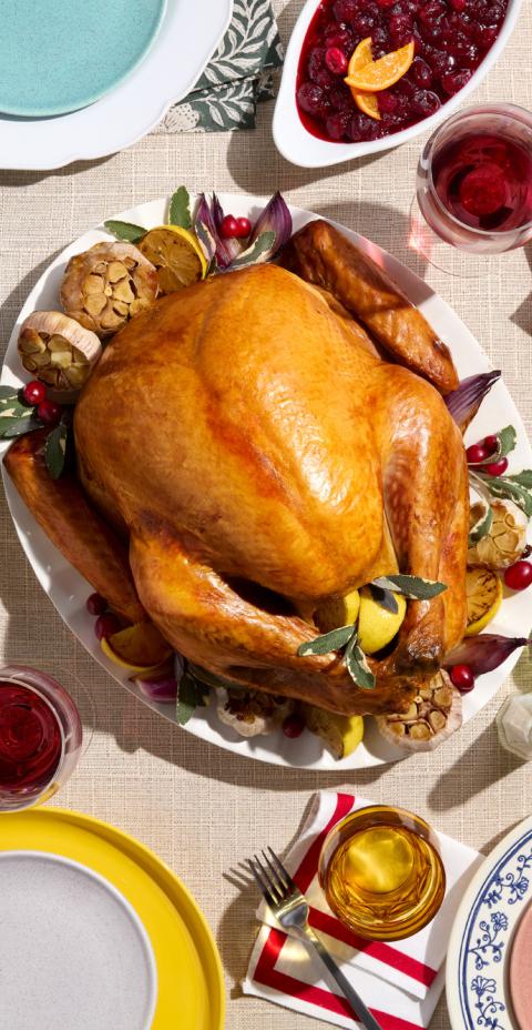 Thanksgiving spread: a turkey surrounded by sides