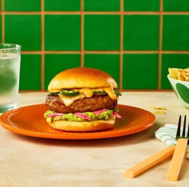 A Butterball Tex-Mex ground turkey burger with jalepenos, melted cheese, and guacamole.