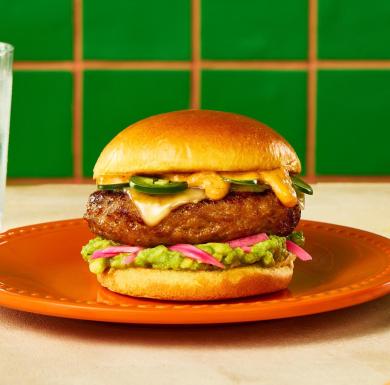 A Butterball Tex-Mex ground turkey burger with jalepenos, melted cheese, and guacamole.