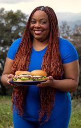 Butterball Spokesgriller holding a tray of food.