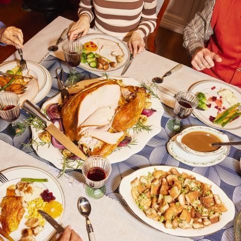 Close up view of a table with turkey dinner spread.