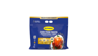 Cook from Frozen Premium Whole turkey from Butterball in a blue package with the caption "Freezer to oven in minutes"